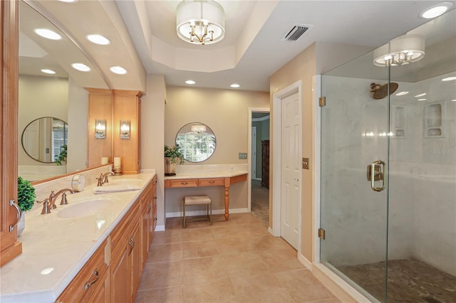 4515 SW 97th Ter, Gainesville, FL 32608 - bathroom featuring a chandelier, tile patterned flooring, a stall shower, recessed lighting, and double vanity