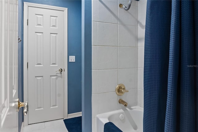 4515 SW 97th Ter, Gainesville, FL 32608 - bathroom with shower / bath combo with shower curtain and tile patterned flooring
