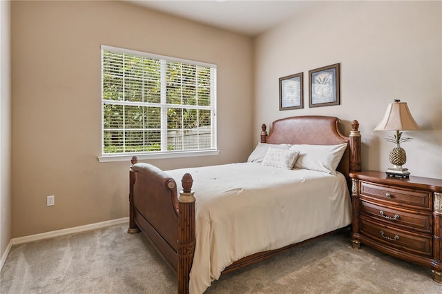 4515 SW 97th Ter, Gainesville, FL 32608 - bedroom featuring light colored carpet and baseboards