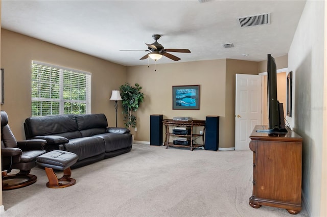 4515 SW 97th Ter, Gainesville, FL 32608 - carpeted living room featuring a ceiling fan and baseboards