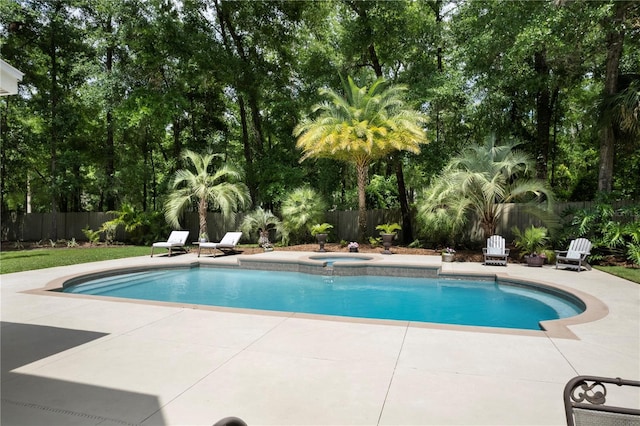4515 SW 97th Ter, Gainesville, FL 32608 - view of pool with a patio area, a fenced backyard, and an in-ground hot tub