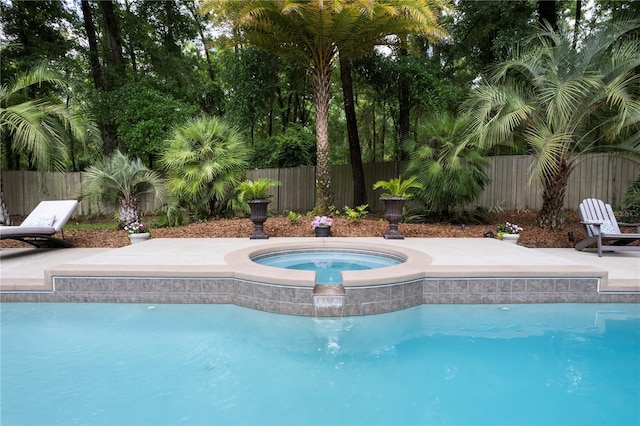 4515 SW 97th Ter, Gainesville, FL 32608 - view of pool with fence and an in-ground hot tub