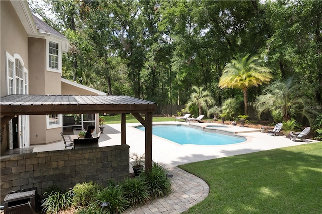 4515 SW 97th Ter, Gainesville, FL 32608 - view of pool with a patio area, view of wooded area, an in-ground hot tub, and a gazebo