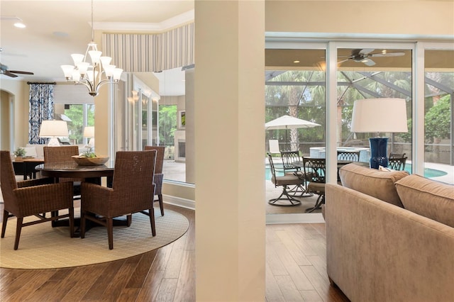 dining room with a ceiling fan, dark wood-style floors, and recessed lighting