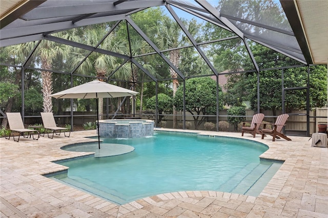 view of swimming pool with a fenced backyard, a patio, a pool with connected hot tub, and a lanai