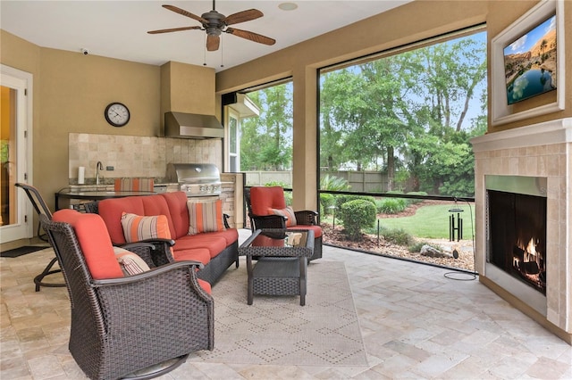 sunroom / solarium with a sink