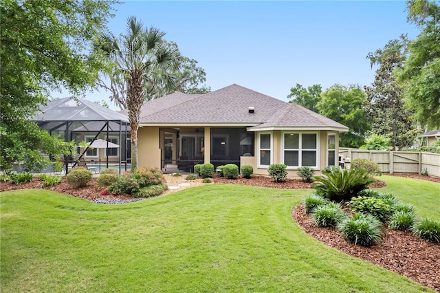 rear view of house with roof with shingles, stucco siding, glass enclosure, and an outdoor pool