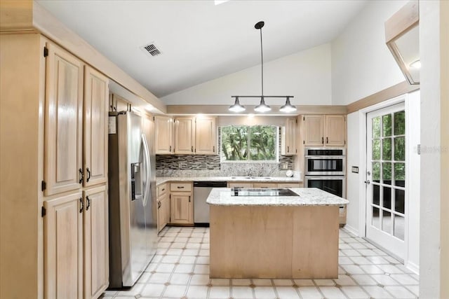 7800 SW 24th Ave, Gainesville, FL 32607 - kitchen featuring appliances with stainless steel finishes, light floors, lofted ceiling, light brown cabinetry, and backsplash