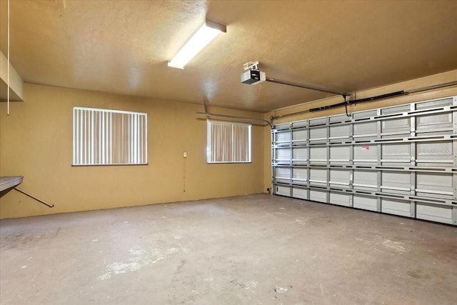 7800 SW 24th Ave, Gainesville, FL 32607 - garage featuring a garage door opener