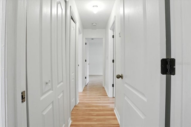 7800 SW 24th Ave, Gainesville, FL 32607 - hall with light wood-type flooring and baseboards