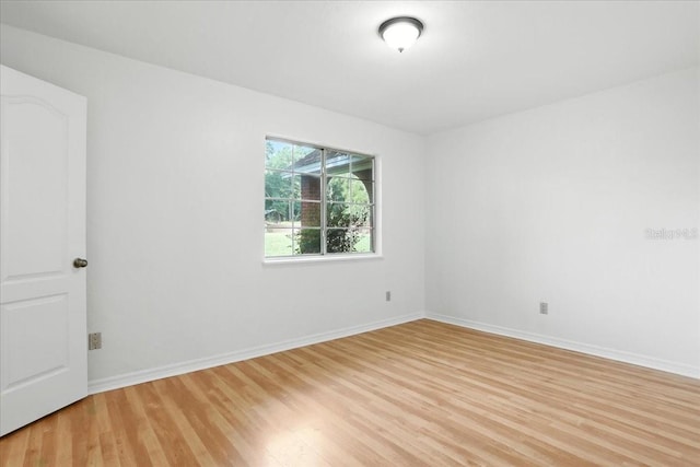 7800 SW 24th Ave, Gainesville, FL 32607 - spare room featuring light wood finished floors and baseboards