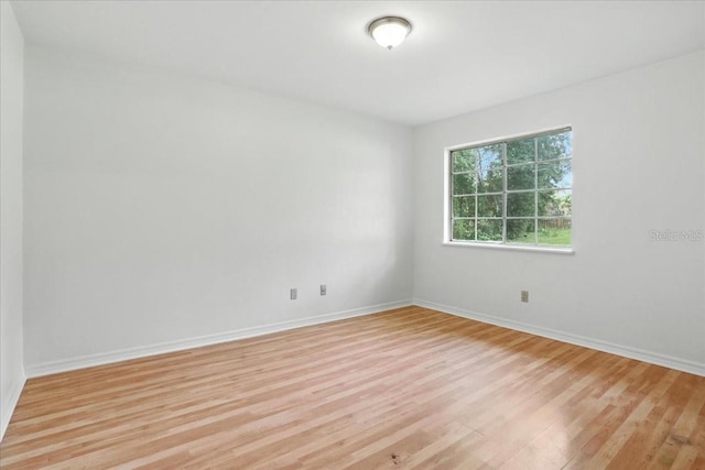 7800 SW 24th Ave, Gainesville, FL 32607 - unfurnished room featuring light wood-style floors and baseboards