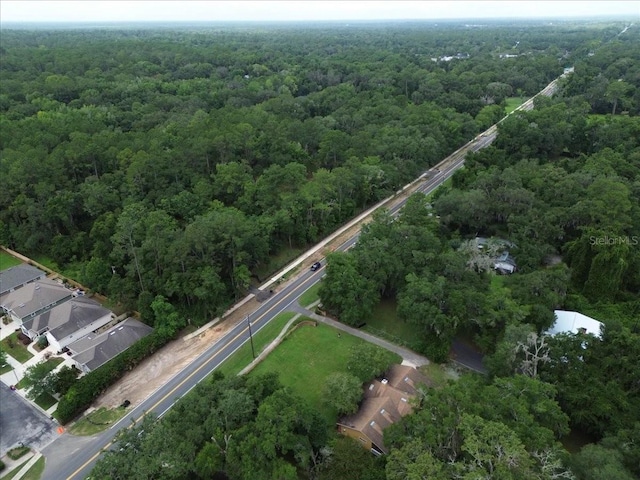 7800 SW 24th Ave, Gainesville, FL 32607 - aerial overview of property's location with a heavily wooded area