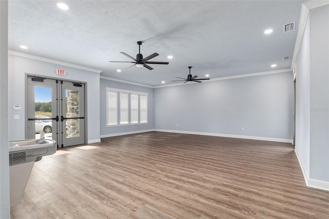 6613 SW 95th St, Gainesville, FL 32608 - unfurnished living room featuring recessed lighting, french doors, baseboards, crown molding, and ceiling fan