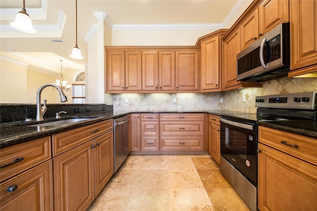 kitchen featuring a sink, appliances with stainless steel finishes, ornamental molding, and brown cabinetry