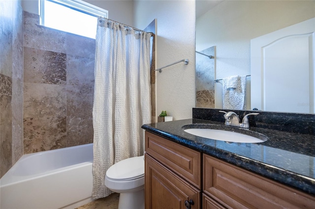 bathroom featuring vanity, shower / bathtub combination with curtain, and toilet