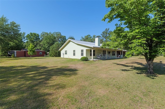 view of yard featuring a porch