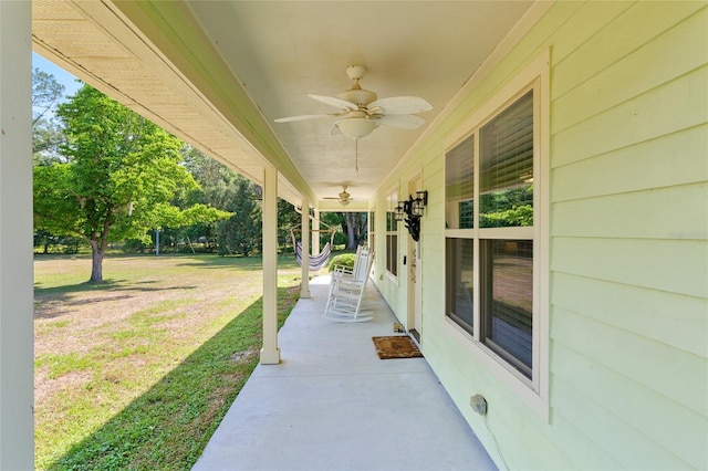 view of patio featuring a ceiling fan and covered porch
