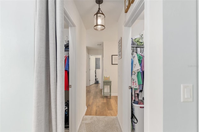 corridor featuring baseboards