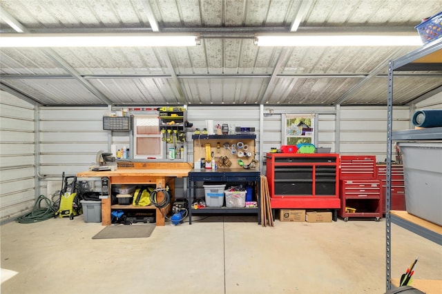 garage with a workshop area