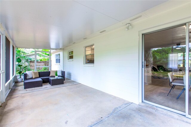 sunroom with an outdoor hangout area