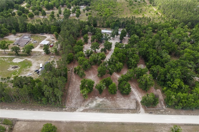 drone / aerial view with a forest view
