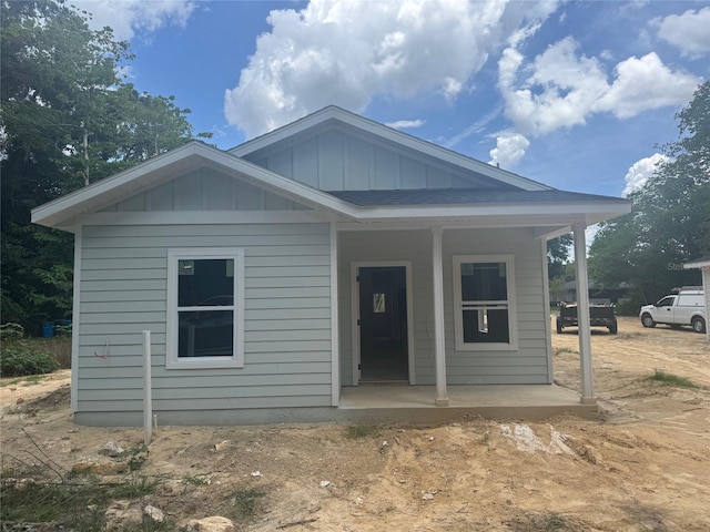23324 NW 178th Ave, High Springs, FL 32643 - view of front of home with board and batten siding and covered porch