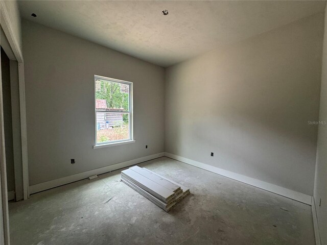 23324 NW 178th Ave, High Springs, FL 32643 - unfurnished room featuring baseboards