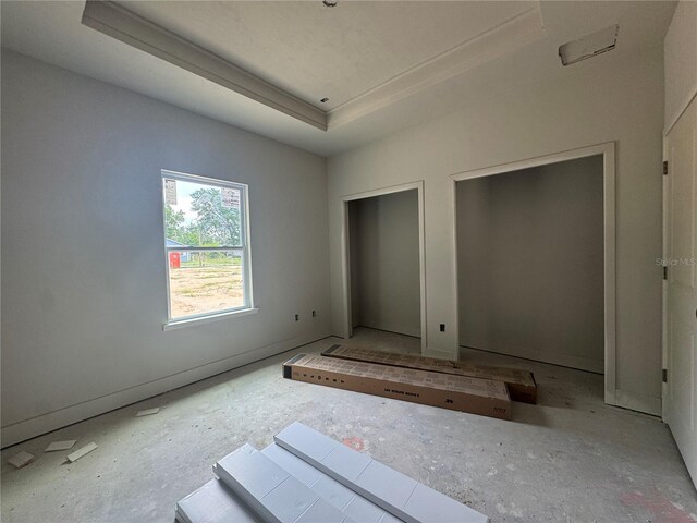23324 NW 178th Ave, High Springs, FL 32643 - unfurnished bedroom with a tray ceiling