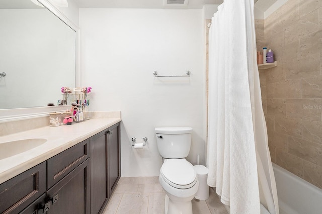 full bathroom featuring shower / bath combination with curtain, visible vents, vanity, tile patterned floors, and toilet