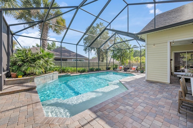 view of pool featuring a fenced in pool, a patio area, and a lanai