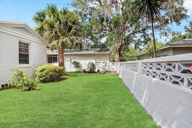 view of yard featuring fence