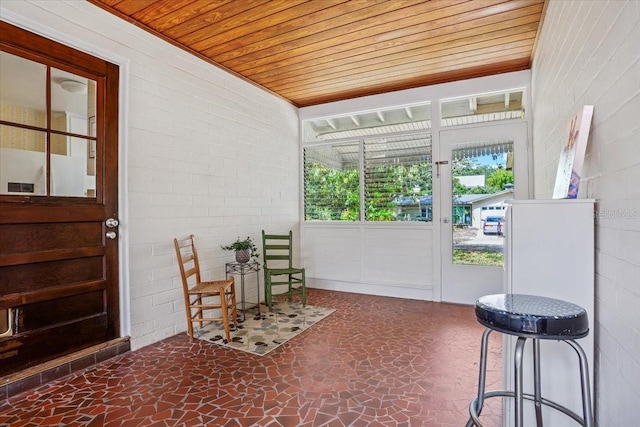 sunroom featuring plenty of natural light