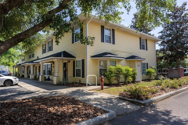colonial home with covered porch