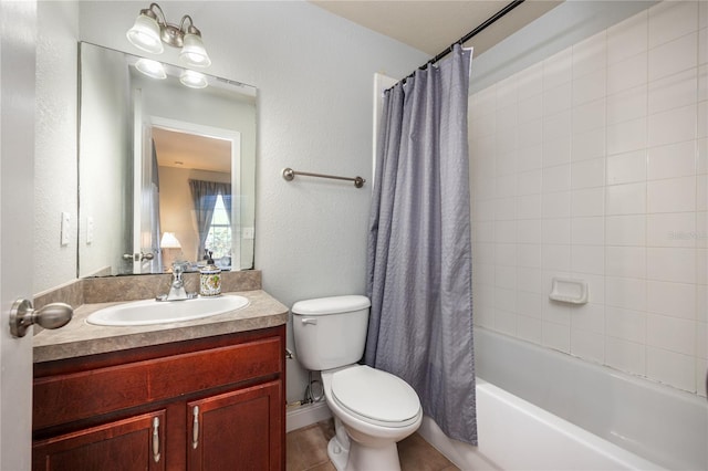 full bath with vanity, tile patterned flooring, a textured wall, toilet, and shower / tub combo