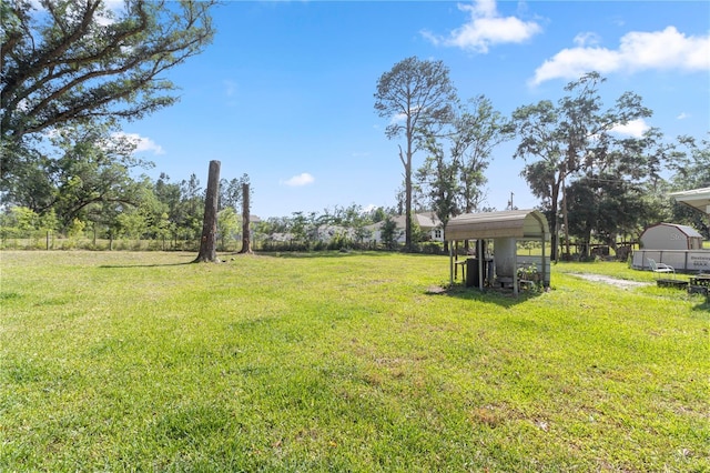 1529 NW 143rd St, Gainesville, FL 32606 - view of green lawn featuring a carport