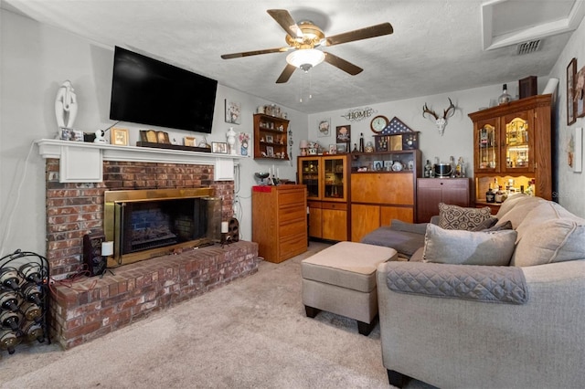 1529 NW 143rd St, Gainesville, FL 32606 - living area with a fireplace, carpet, ceiling fan, and a textured ceiling