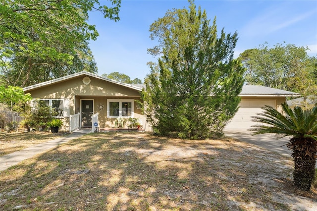 5620 NW 25th St, Gainesville, FL 32653 - view of front of home with an attached garage