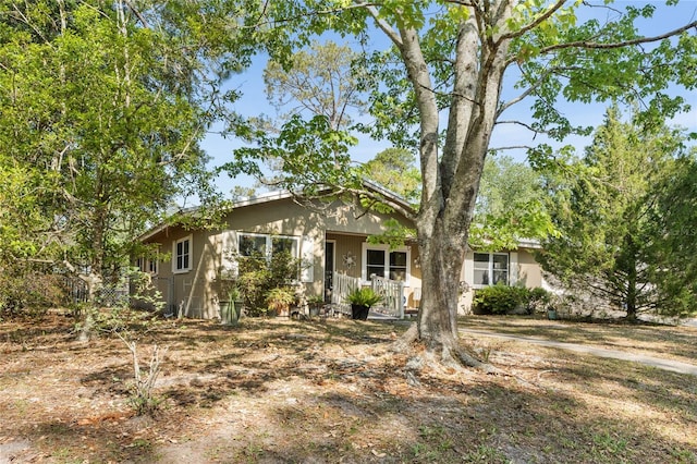 5620 NW 25th St, Gainesville, FL 32653 - view of front of home with a porch