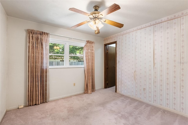 5620 NW 25th St, Gainesville, FL 32653 - unfurnished bedroom with ceiling fan, carpet flooring, and baseboards