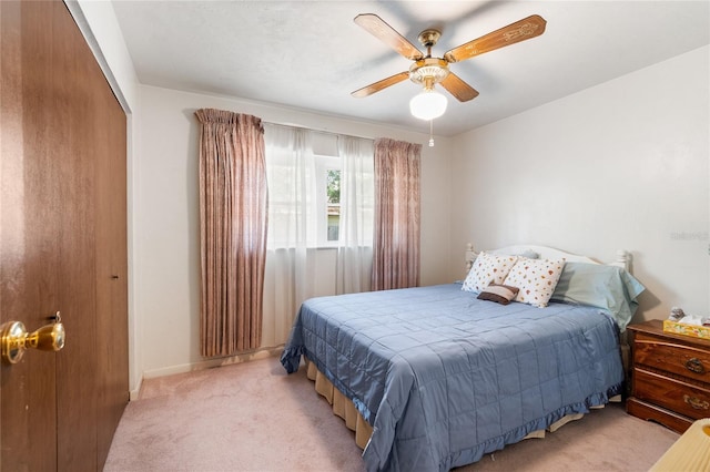5620 NW 25th St, Gainesville, FL 32653 - carpeted bedroom featuring a closet, a ceiling fan, and baseboards