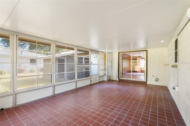 5620 NW 25th St, Gainesville, FL 32653 - unfurnished sunroom with tile patterned flooring