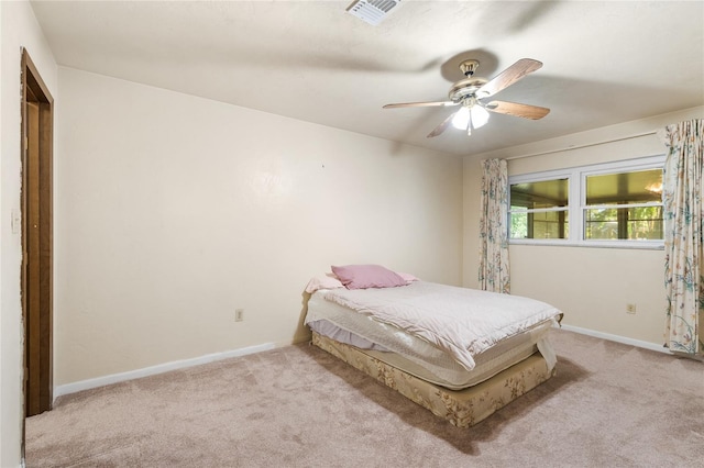 5620 NW 25th St, Gainesville, FL 32653 - carpeted bedroom with ceiling fan, baseboards, and visible vents