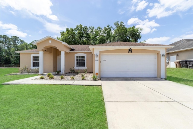 2648 NE 24th Pl, Ocala, FL 34470 - view of front of house with stucco siding, an attached garage, driveway, and a front lawn