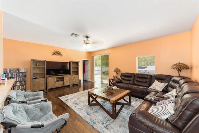 2648 NE 24th Pl, Ocala, FL 34470 - living area with a ceiling fan, visible vents, and dark wood-style floors