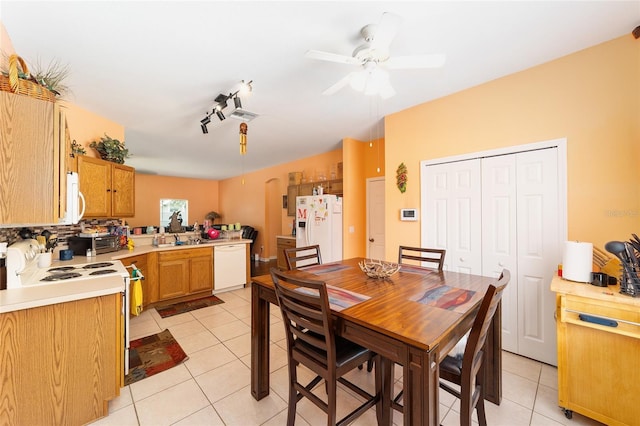 2648 NE 24th Pl, Ocala, FL 34470 - dining space featuring ceiling fan and light tile patterned floors