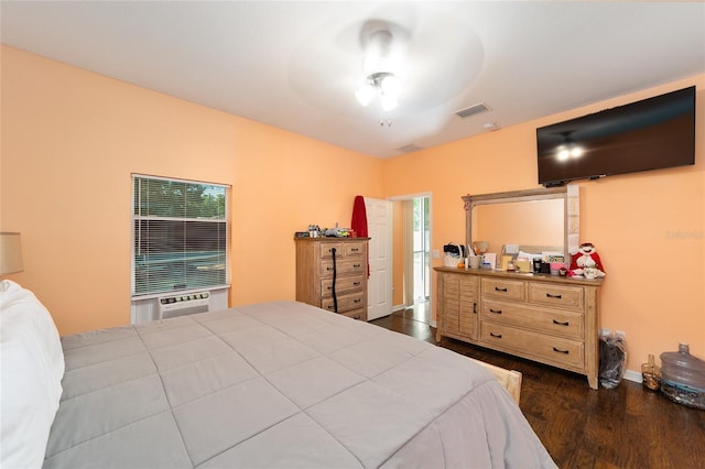 2648 NE 24th Pl, Ocala, FL 34470 - bedroom with dark wood-type flooring, baseboards, and visible vents