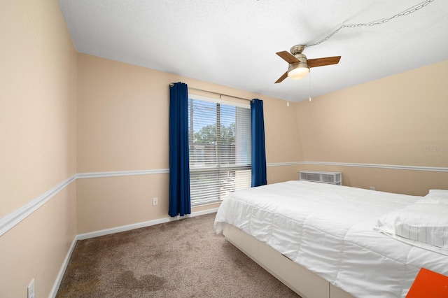 bedroom with baseboards, carpet flooring, and ceiling fan