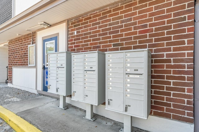 view of home's community with mail area