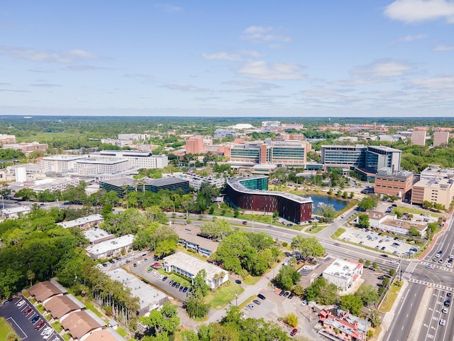 drone / aerial view featuring a city view